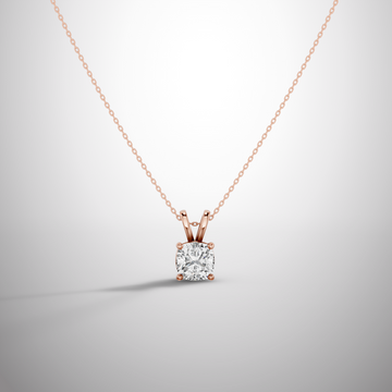 Close-up of 1 carat cushion cut moissanite pendant in sterling silver prong setting