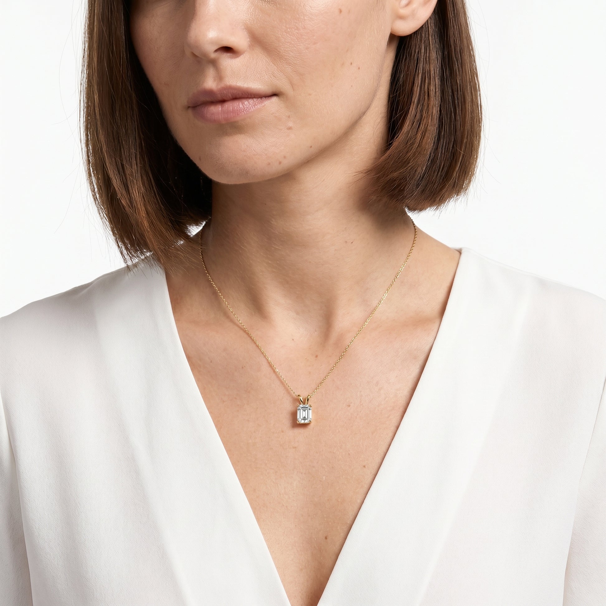 1 carat emerald cut moissanite pendant necklace in 925 sterling silver solitaire setting