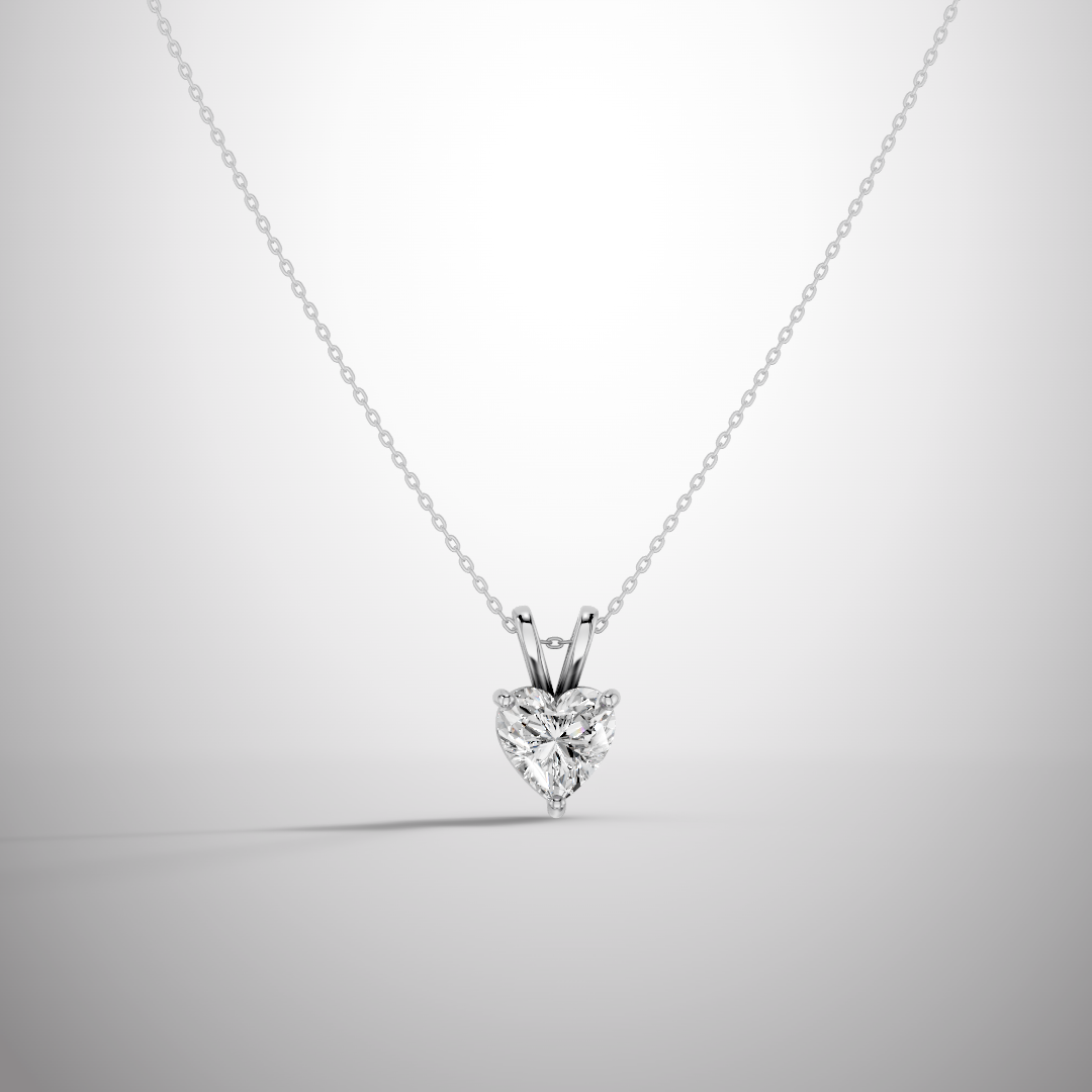 Close-up of 1 carat heart cut moissanite pendant in sterling silver prong setting