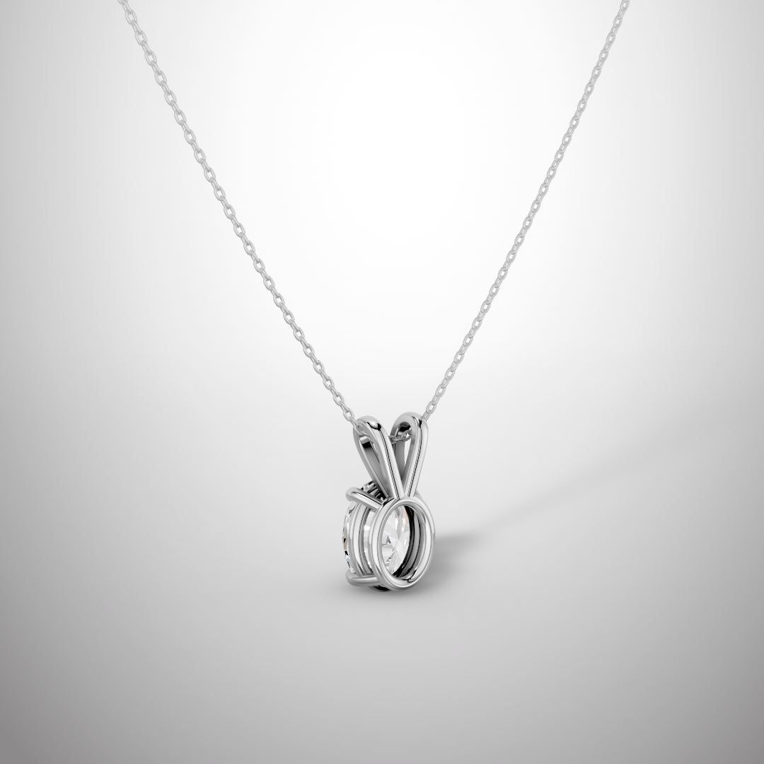 Side view of 1 carat oval moissanite pendant showing silver prong setting detail