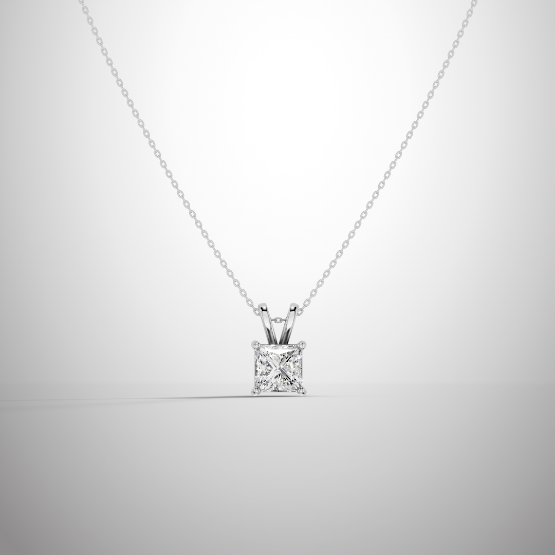 Close-up of 1 carat princess cut moissanite pendant in sterling silver prong setting