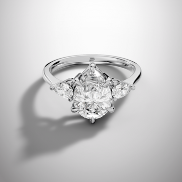 2 carat Pear cut moissanite three stone ring in 925 sterling silver front view