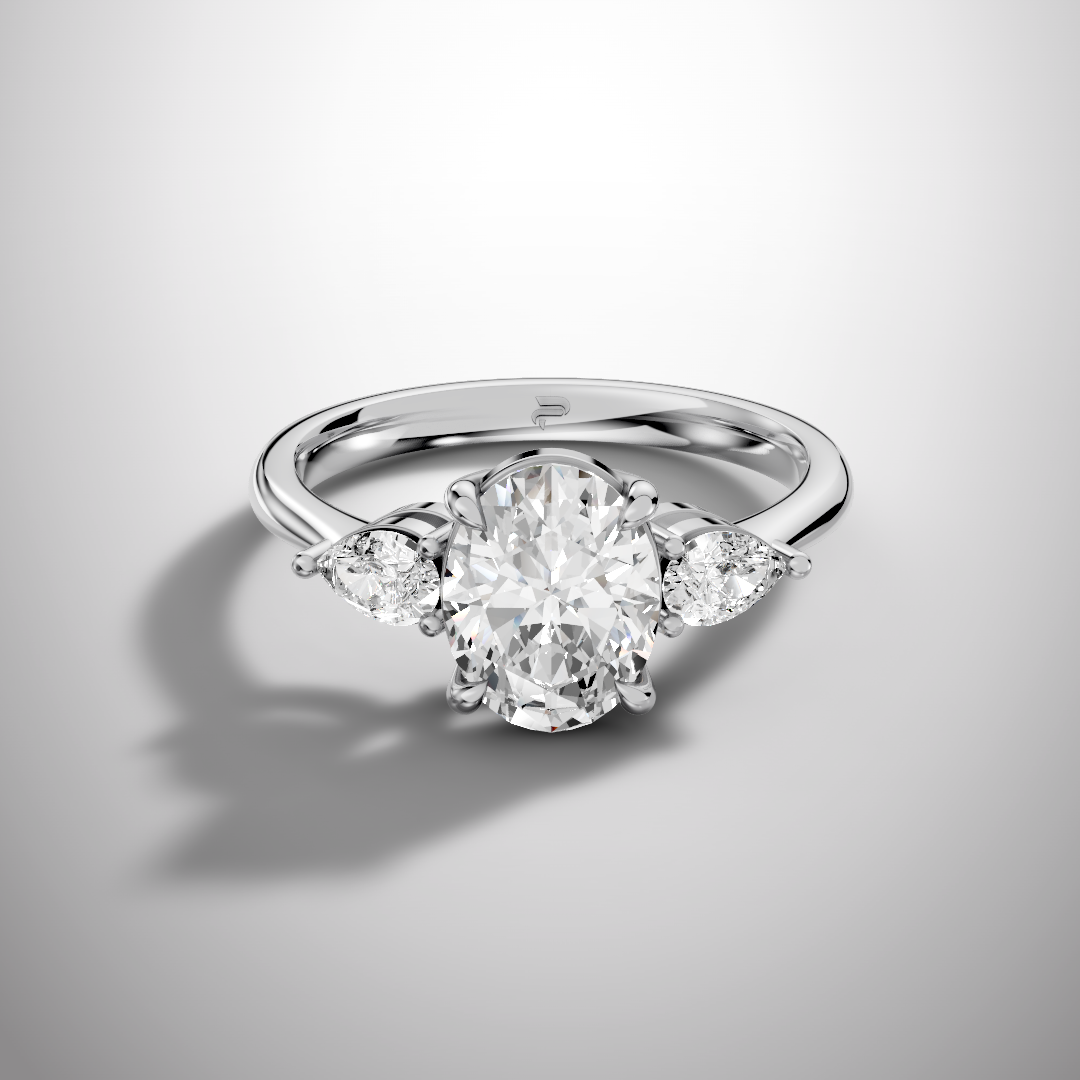 Three-Stone Oval Moissanite Engagement Ring with Pear Side Stones in 925 Sterling Silver
