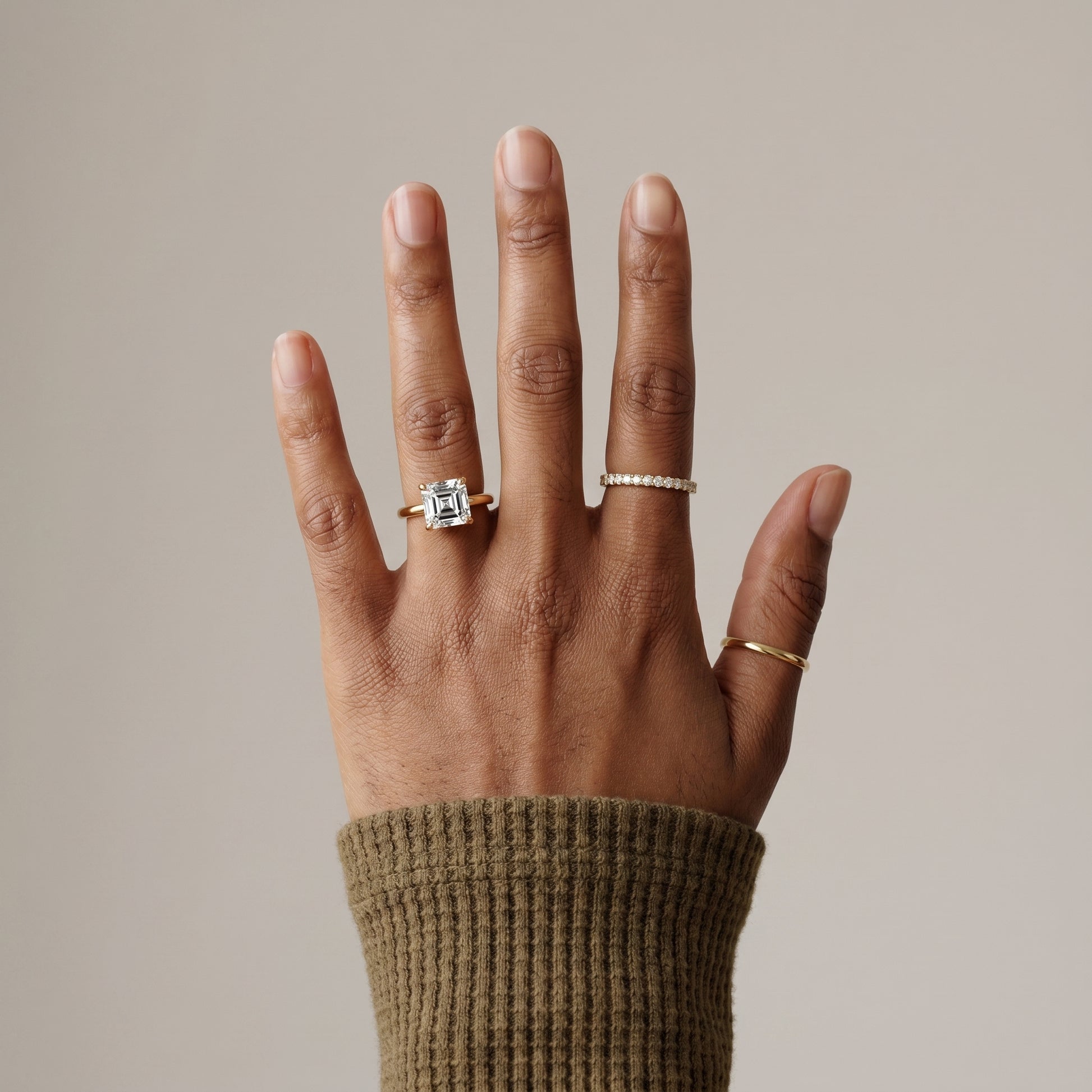 Square step cut moissanite ring with gold band minimalist style
