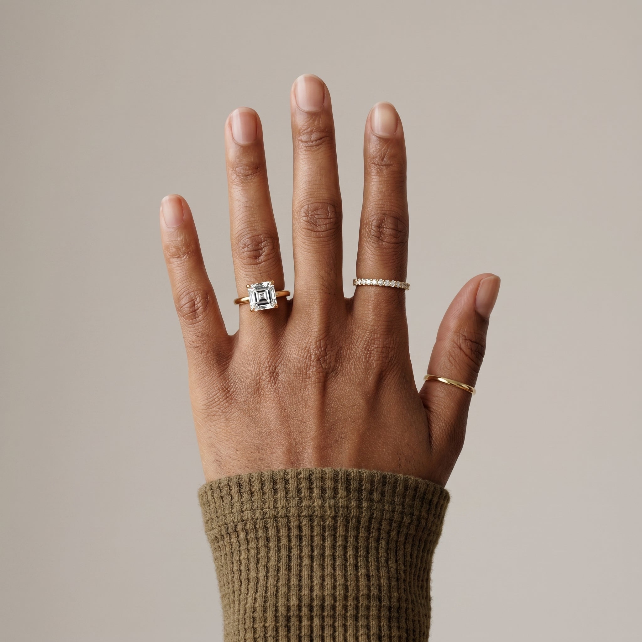 Square step cut moissanite ring with gold band minimalist style