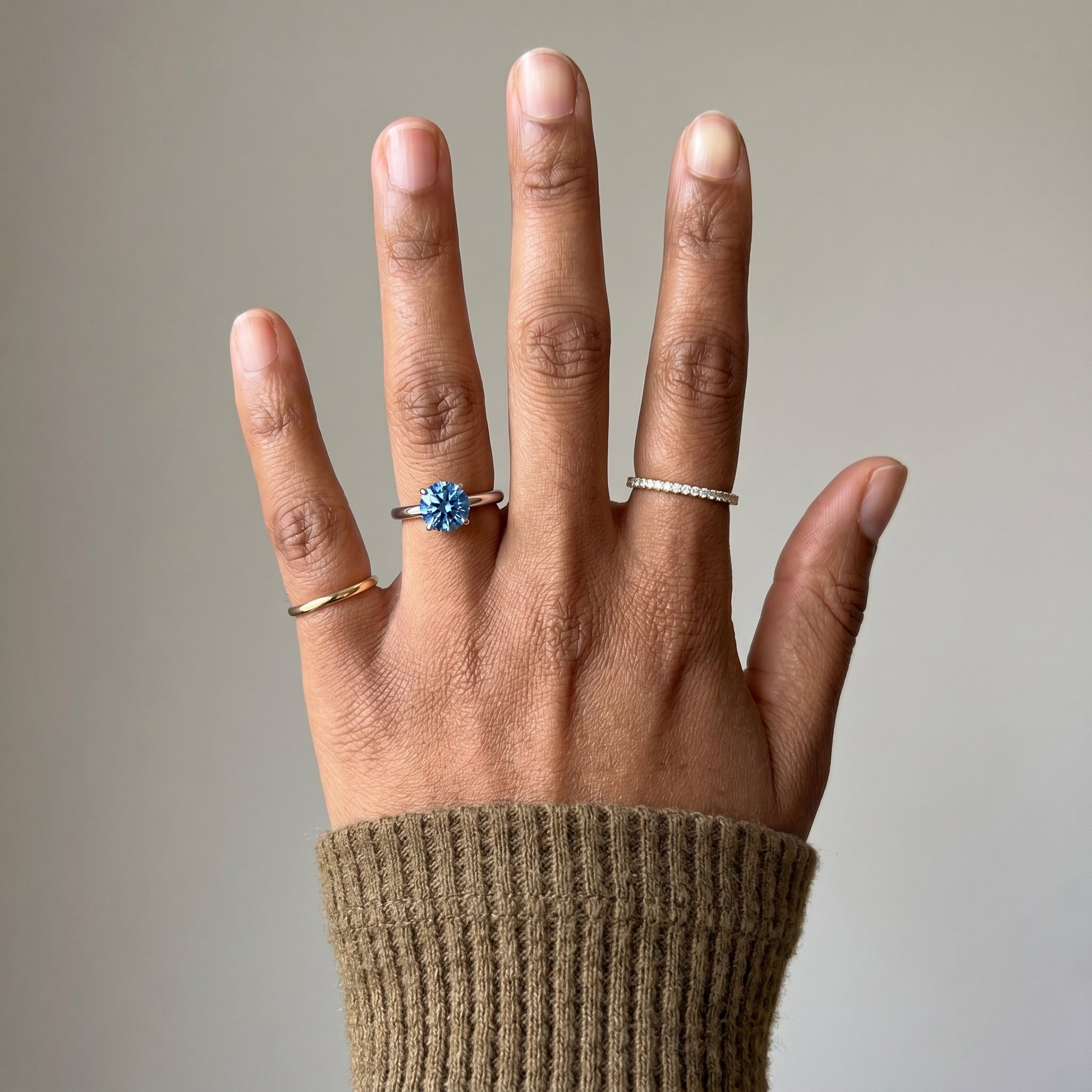Round blue moissanite ring with 925 silver band minimalist design
