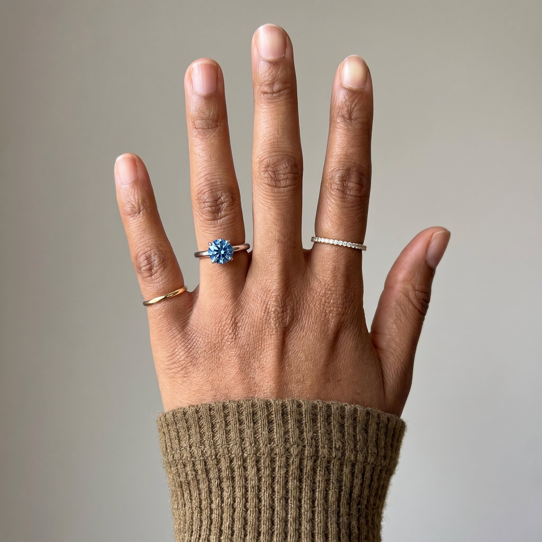 Round blue moissanite ring with 925 silver band minimalist design