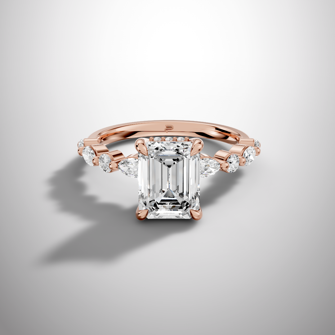Emerald cut moissanite solitaire ring with hidden halo and side stones in yellow gold finish front view