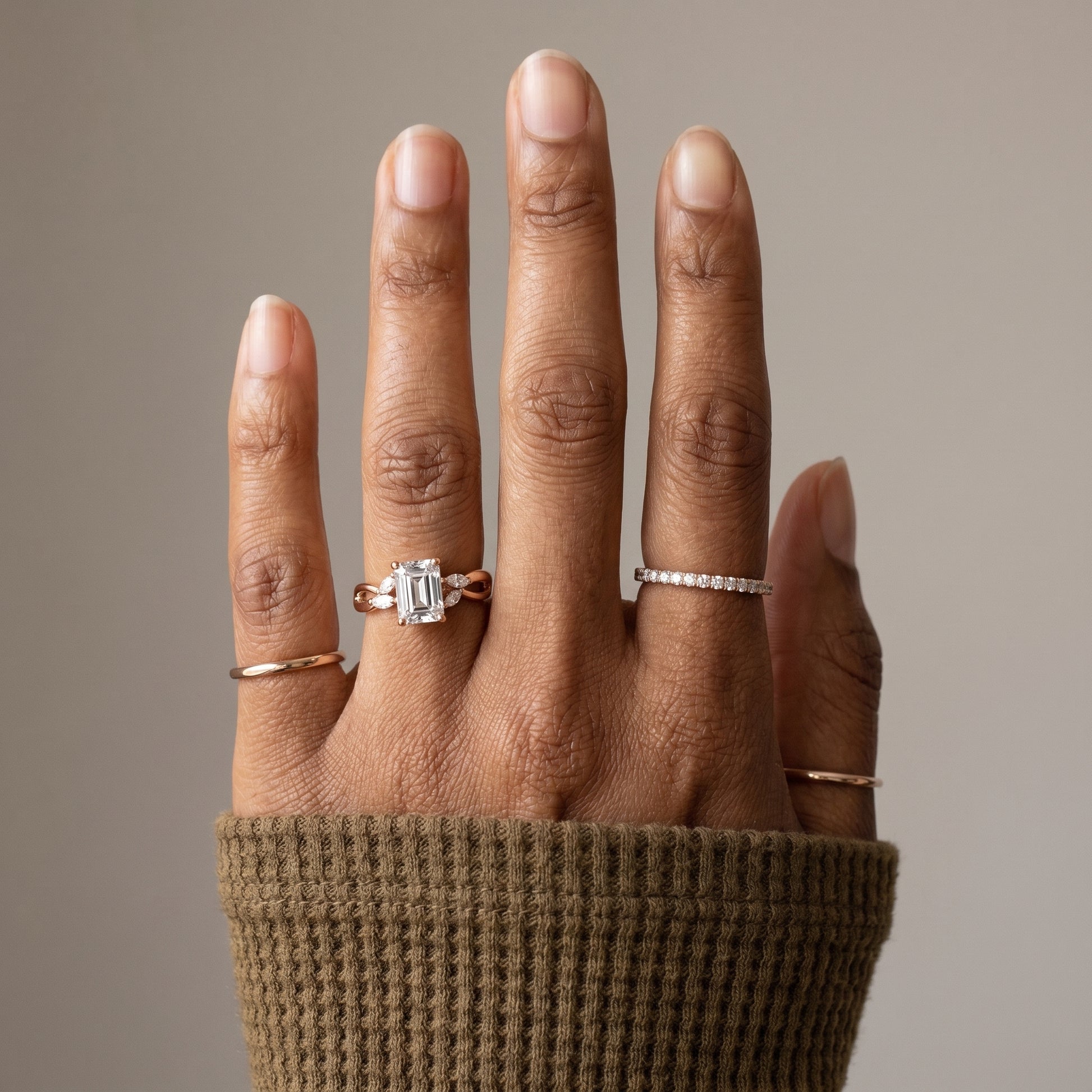 side view of 1.5 carat emerald cut moissanite infinity ring 925 silver