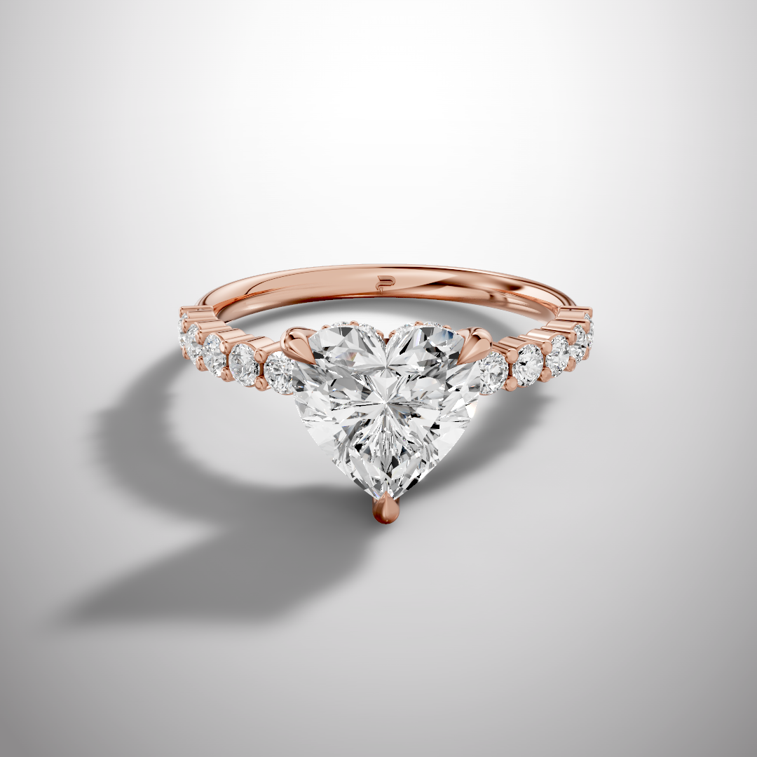 Heart cut moissanite solitaire ring with pavé band in 925 sterling silver front view
