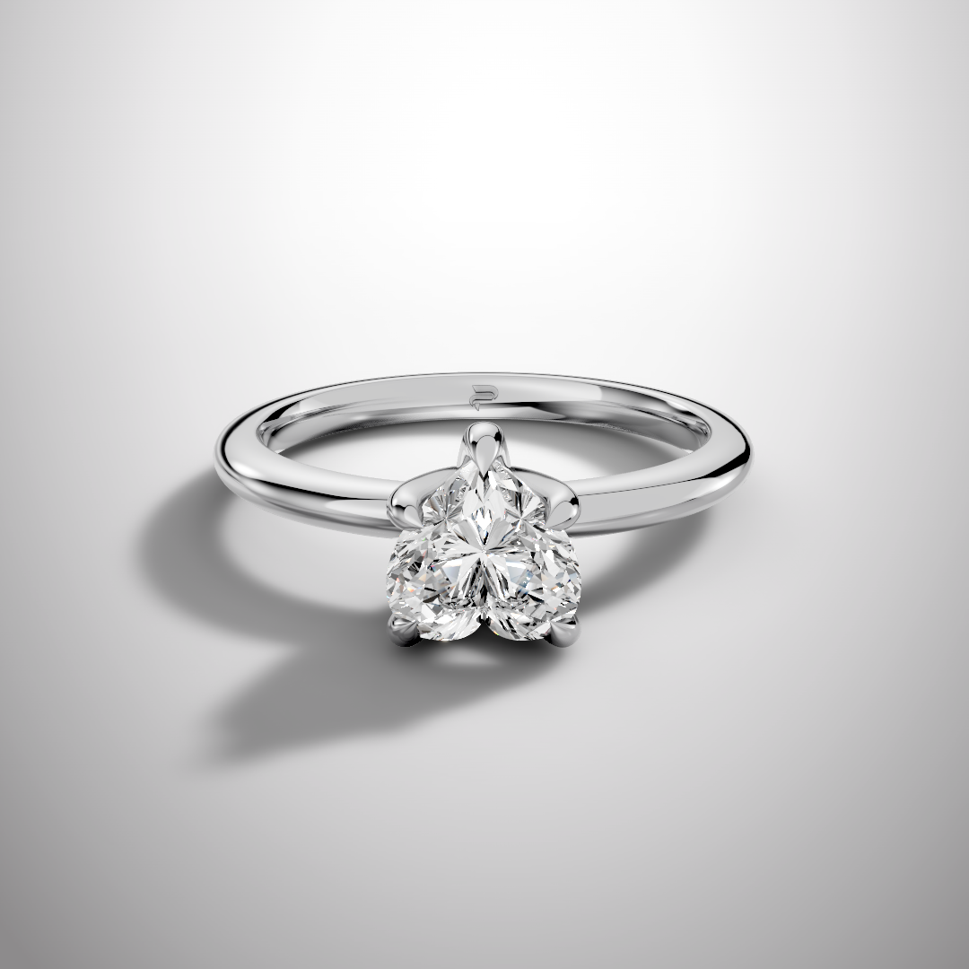 Heart shaped moissanite engagement ring in white gold elegant solitaire