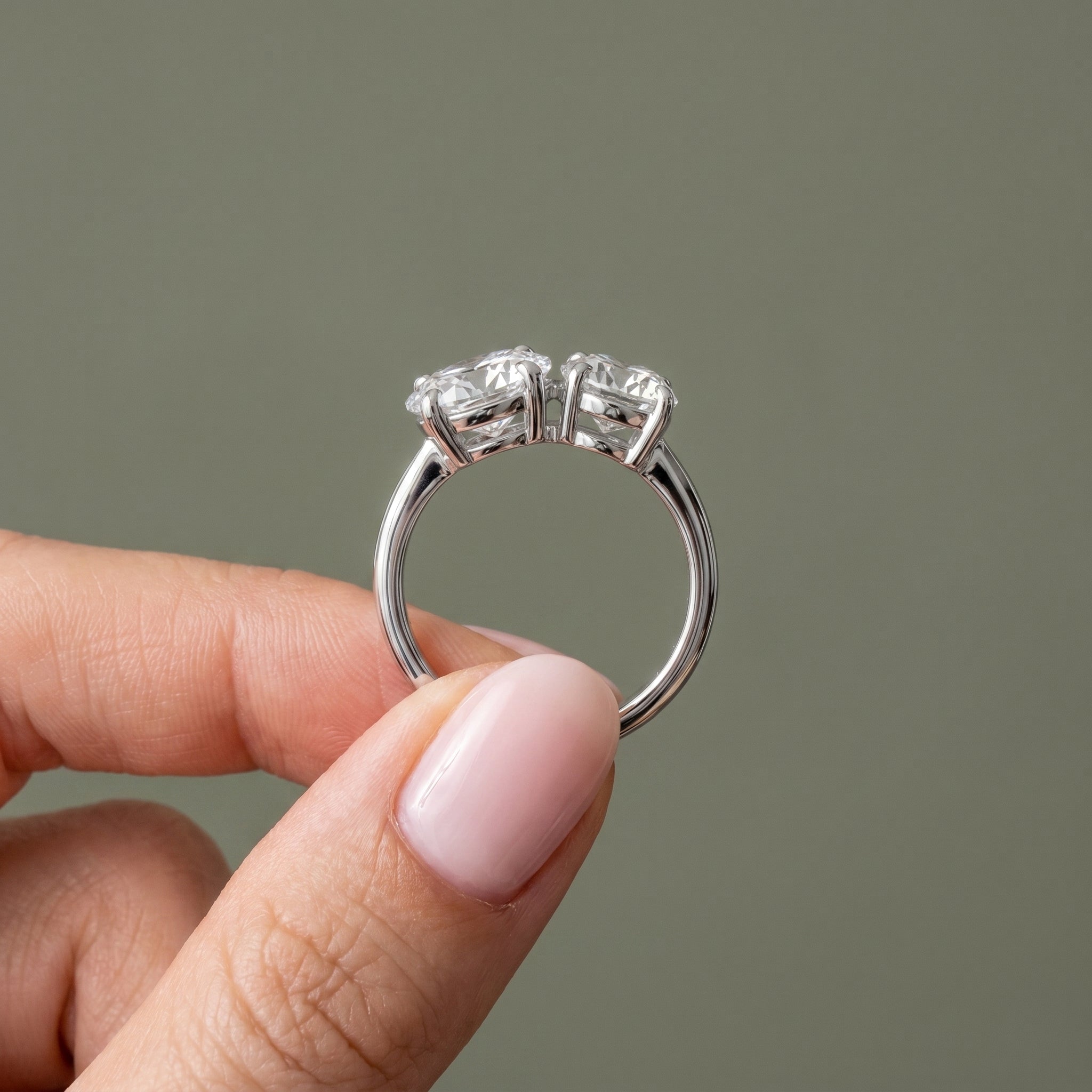 Premium oval and round moissanite engagement ring minimalist luxury style