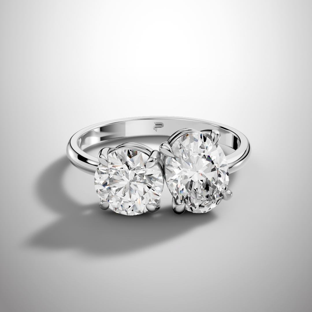 Luxury Toi et Moi moissanite ring with oval and round cut stones in sterling silver