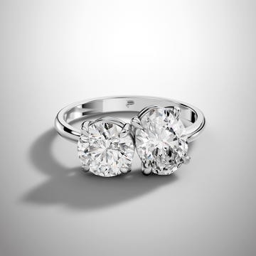 Luxury Toi et Moi moissanite ring with oval and round cut stones in sterling silver