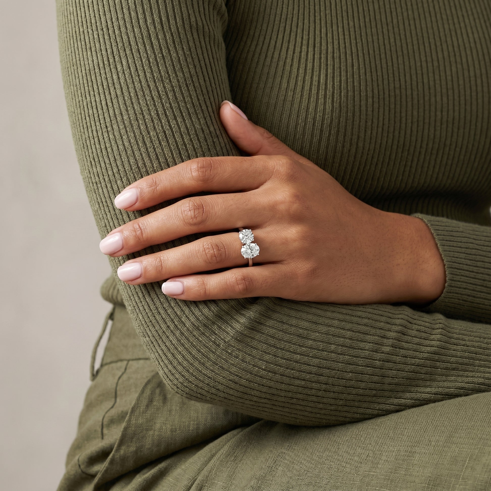 Luxury Toi et Moi moissanite ring oval and round in fine jewelry presentation
