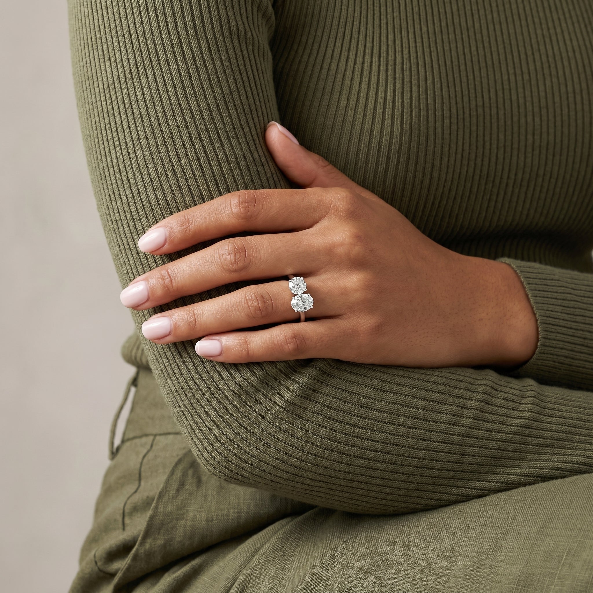 Luxury Toi et Moi moissanite ring oval and round in fine jewelry presentation