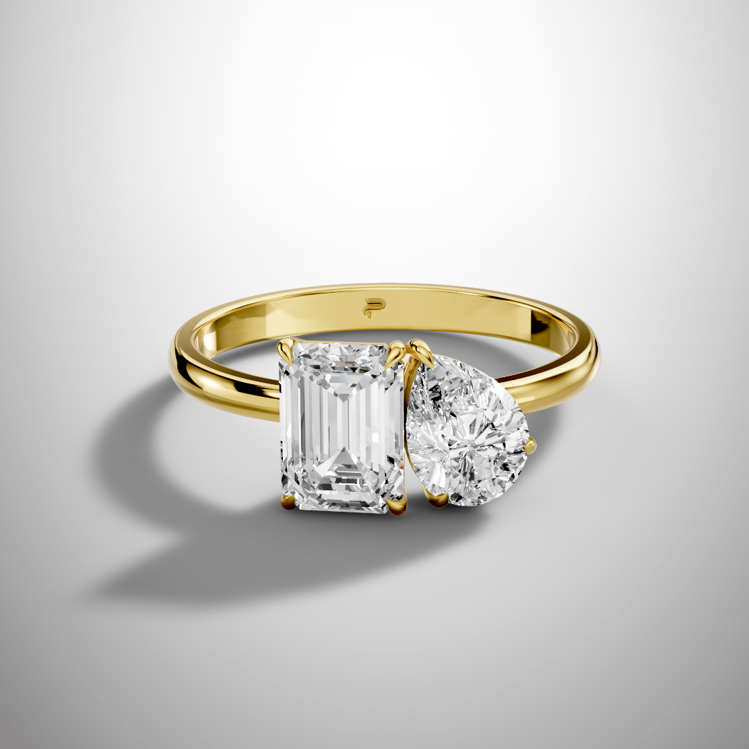Luxury Toi et Moi moissanite ring with emerald and round cut stones