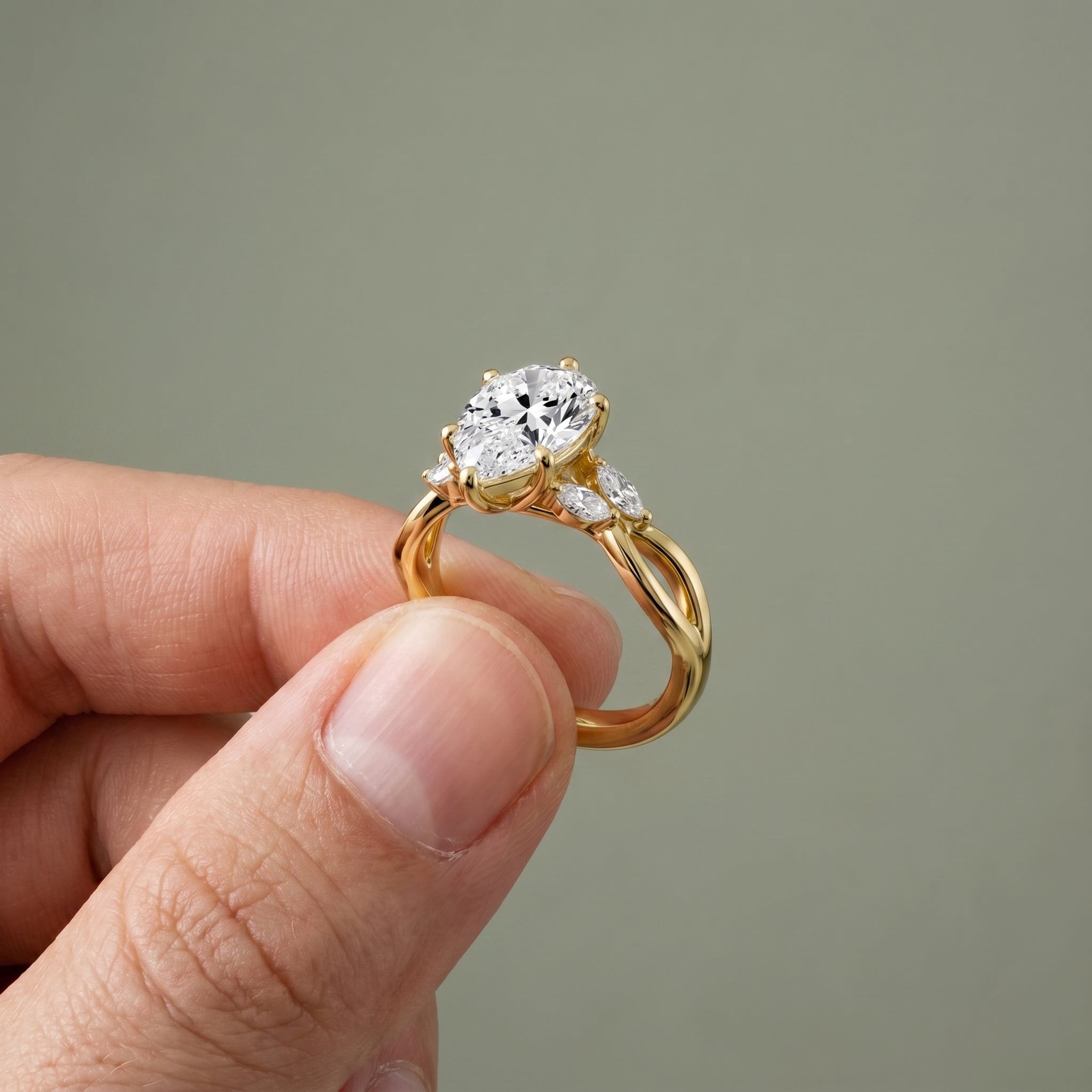 1.5 Carat Pear Cut Moissanite Infinity Engagement Ring in 925 Sterling Silver