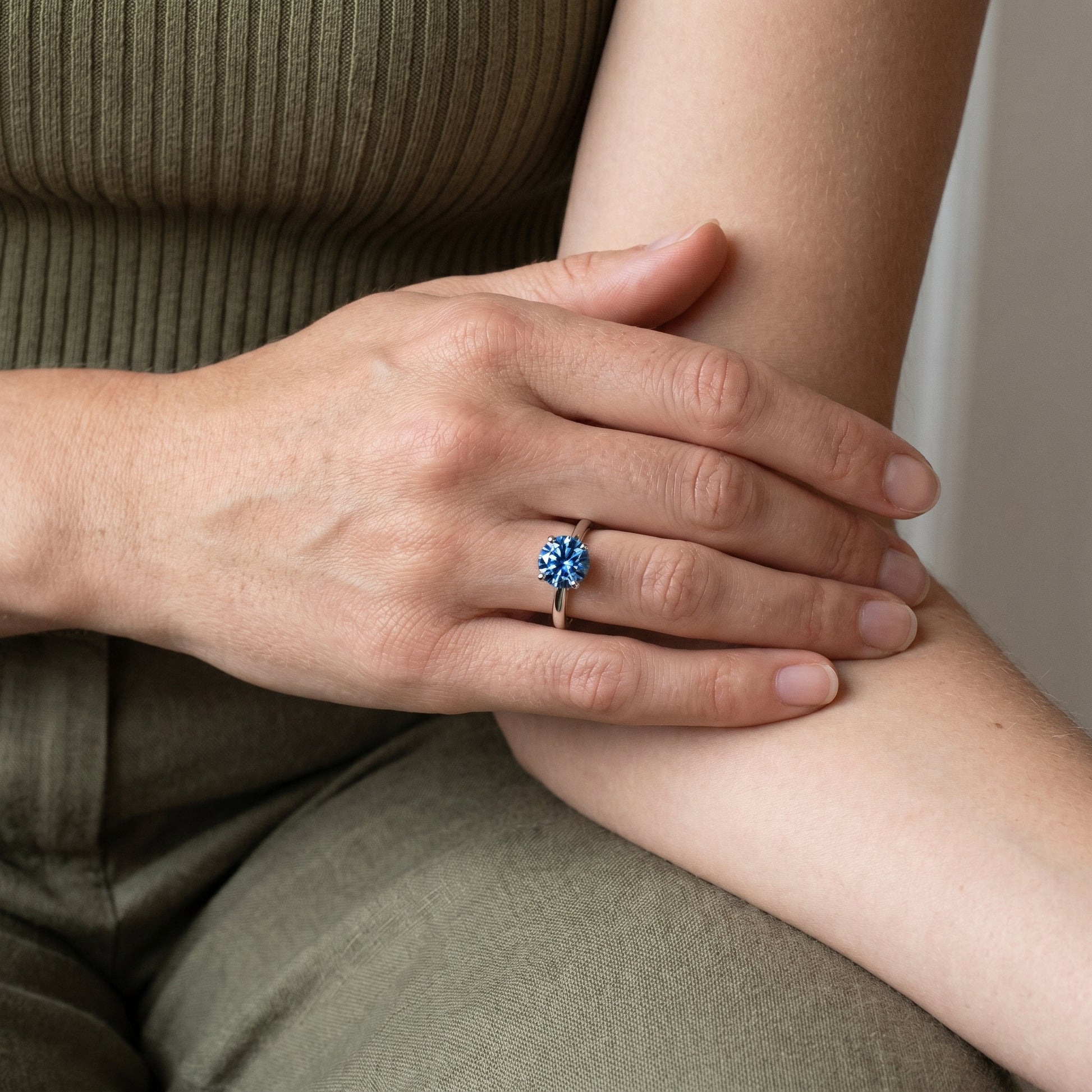 Minimalist blue moissanite engagement ring sleek silver band