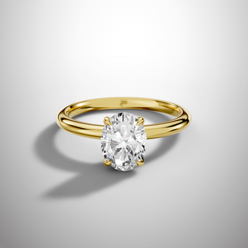 Oval moissanite solitaire ring in yellow gold with 4 prong setting minimalist engagement ring

