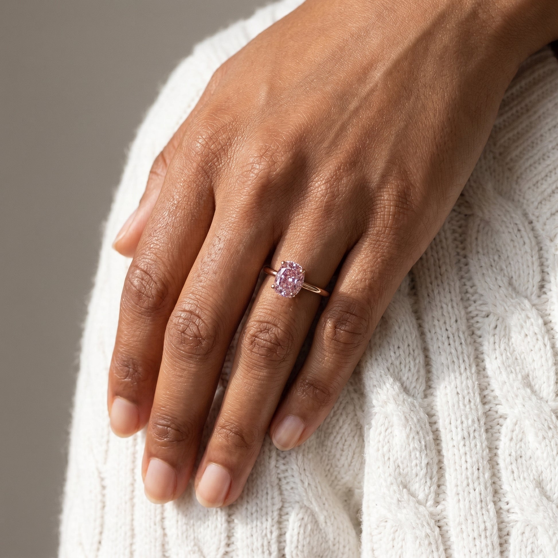 Side view pink cushion moissanite ring hidden halo yellow gold thin band detail
