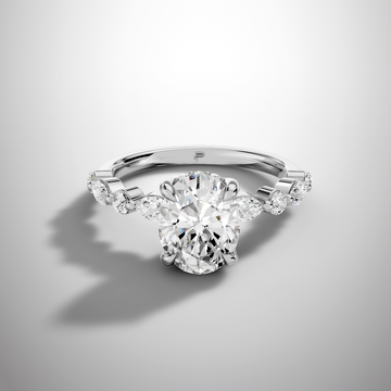 Round moissanite solitaire ring with hidden halo and side stones in 925 sterling silver front view