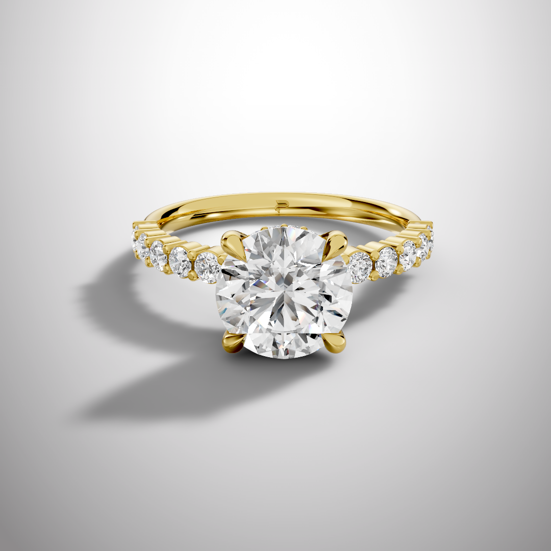 Round moissanite solitaire engagement ring in silver with pavé side stones and elegant slim band