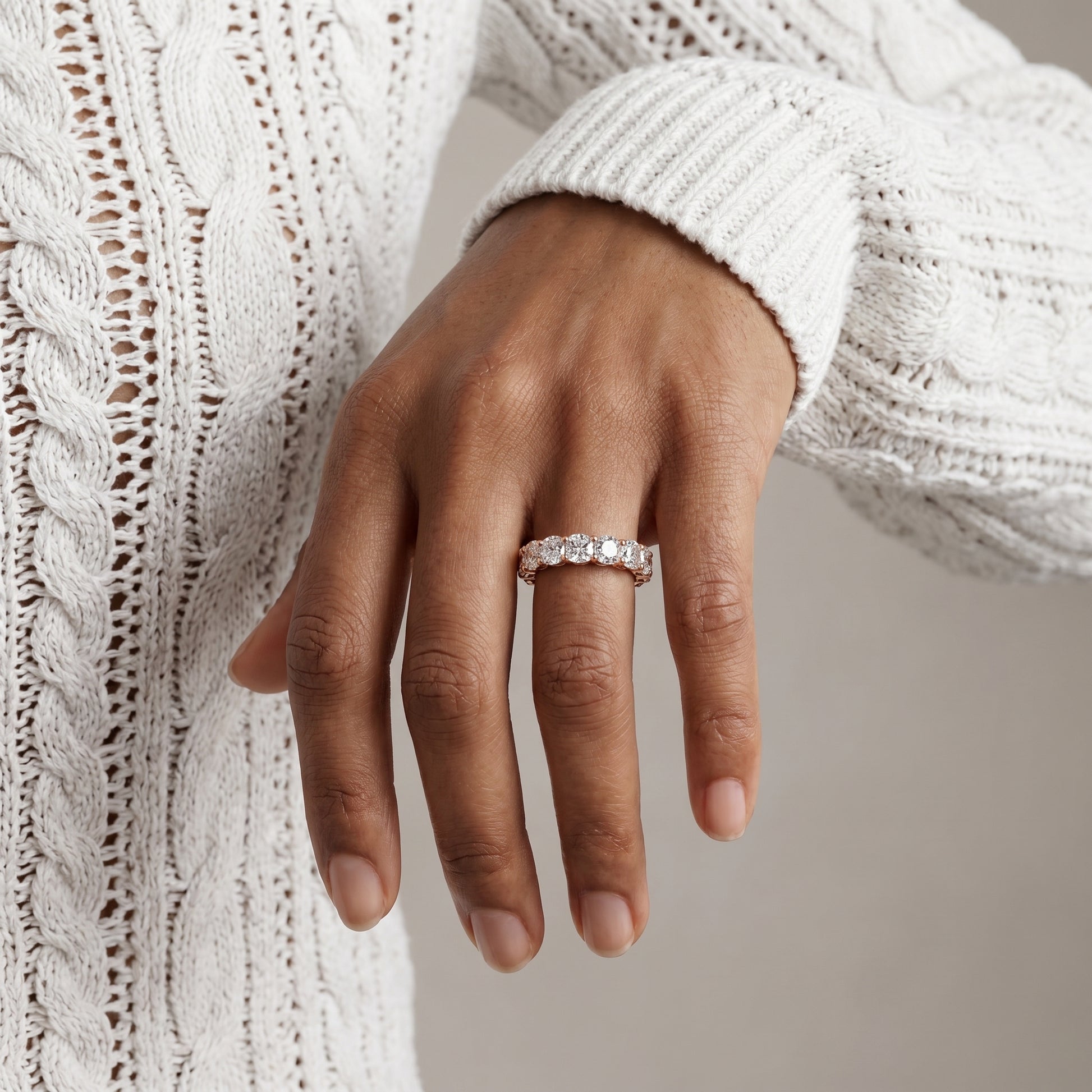 luxury silver moissanite eternity ring worn by model stylish elegant jewelry look
